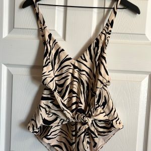 Zebra show me your Mumu brand one piece swimsuit.